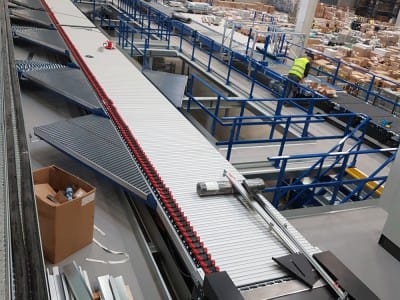 Delivery and installation of mezzanine shelving system. 2